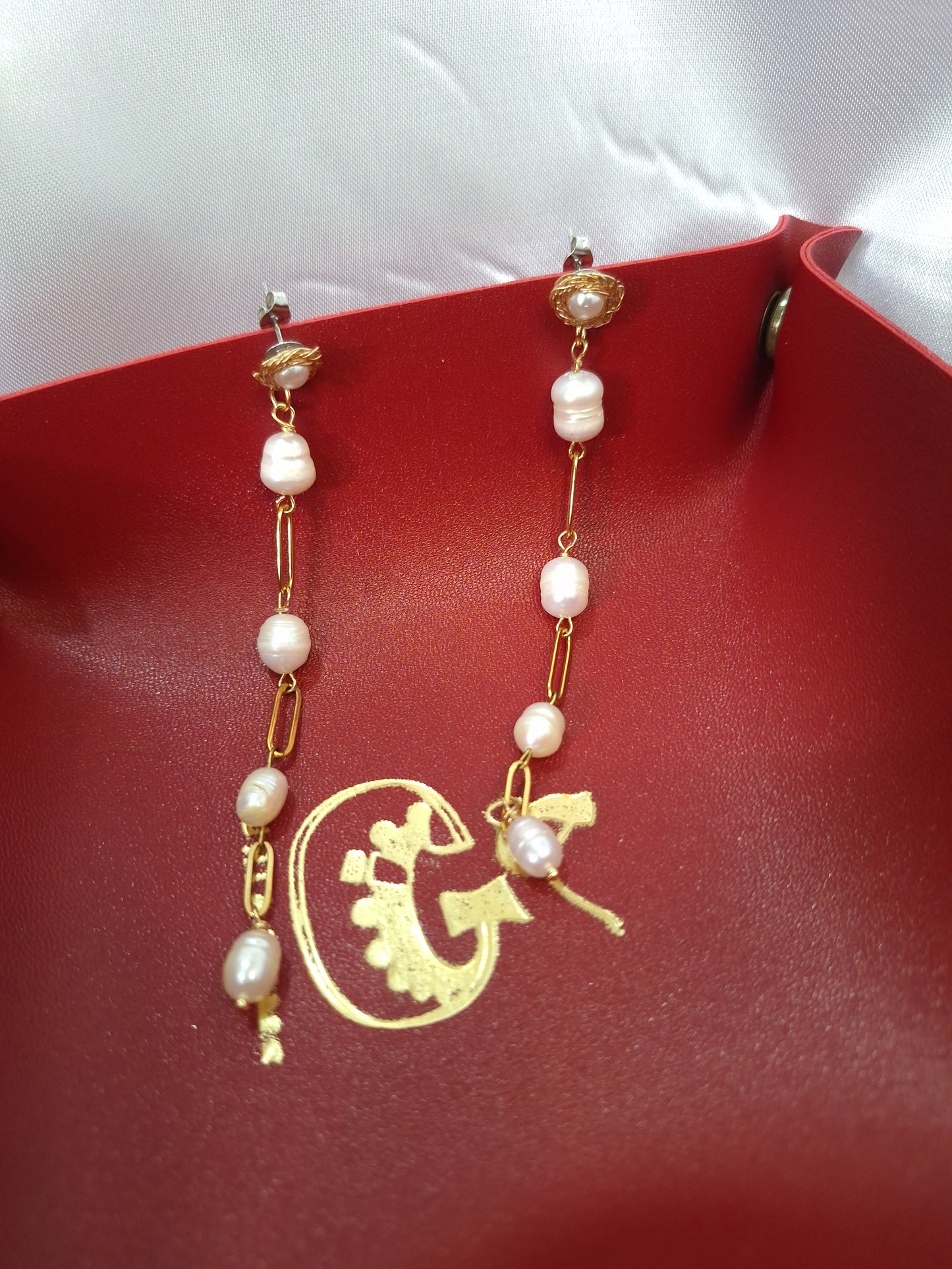 Nestled pearl earrings